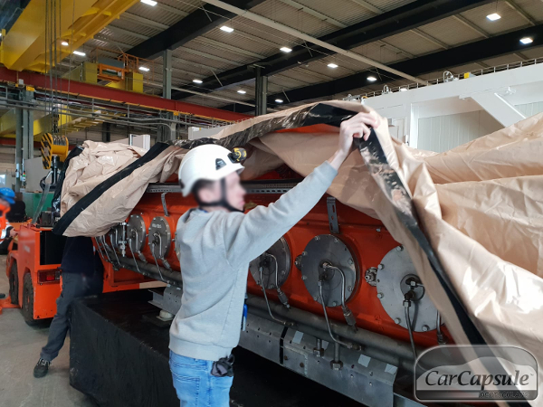 cern_carcapsule_sonderprojekt_testroehren_staubsicher_transport_montage_organisation_kernforschung